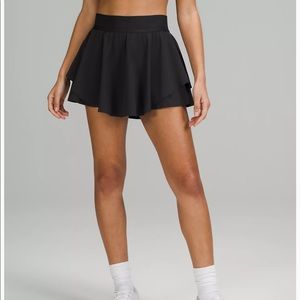Lululemon court rival high rise skirt black. Size 2. Never worn. Still has tags.